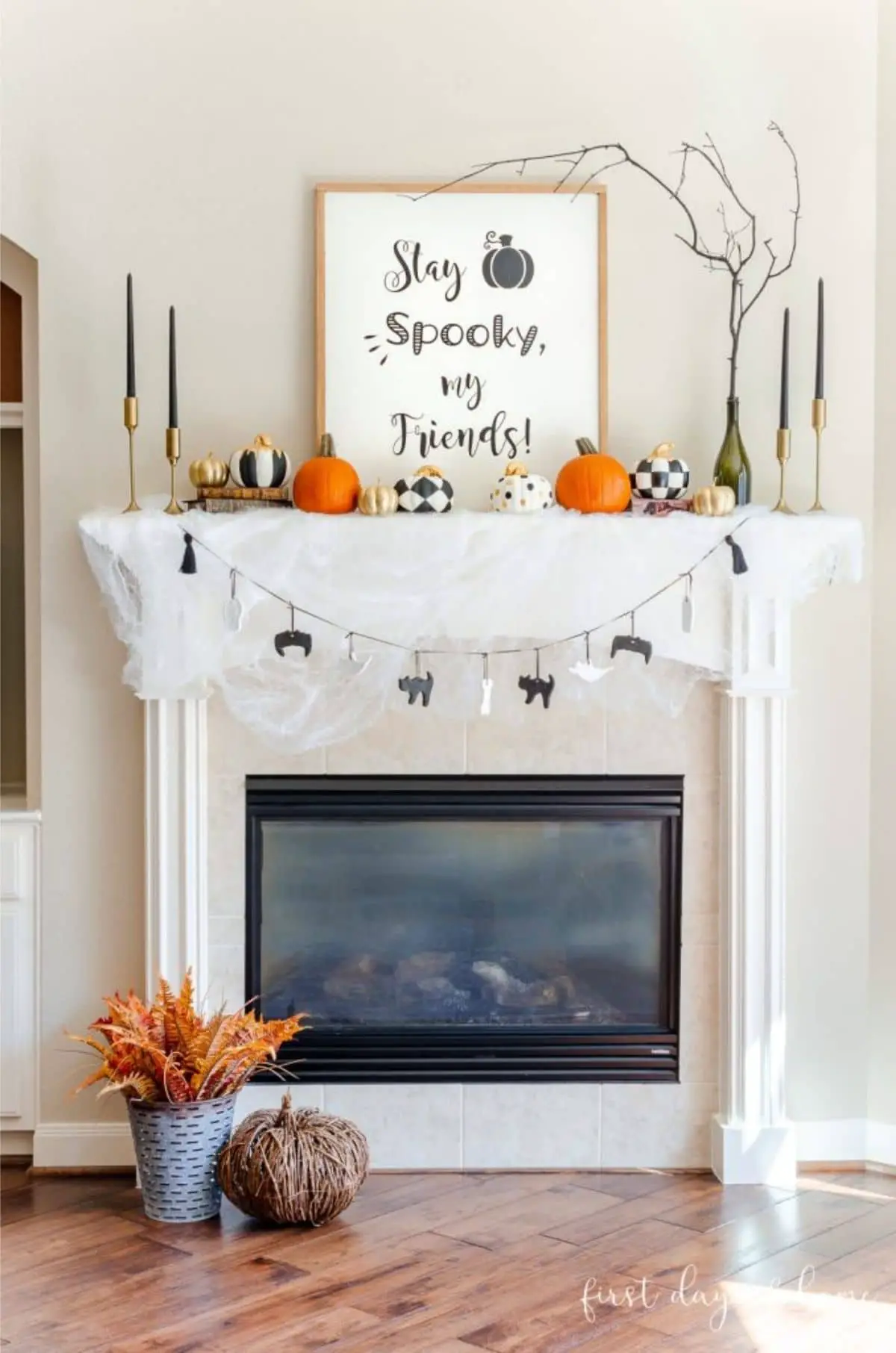mantel with picture that says Stay Spooky my Friends