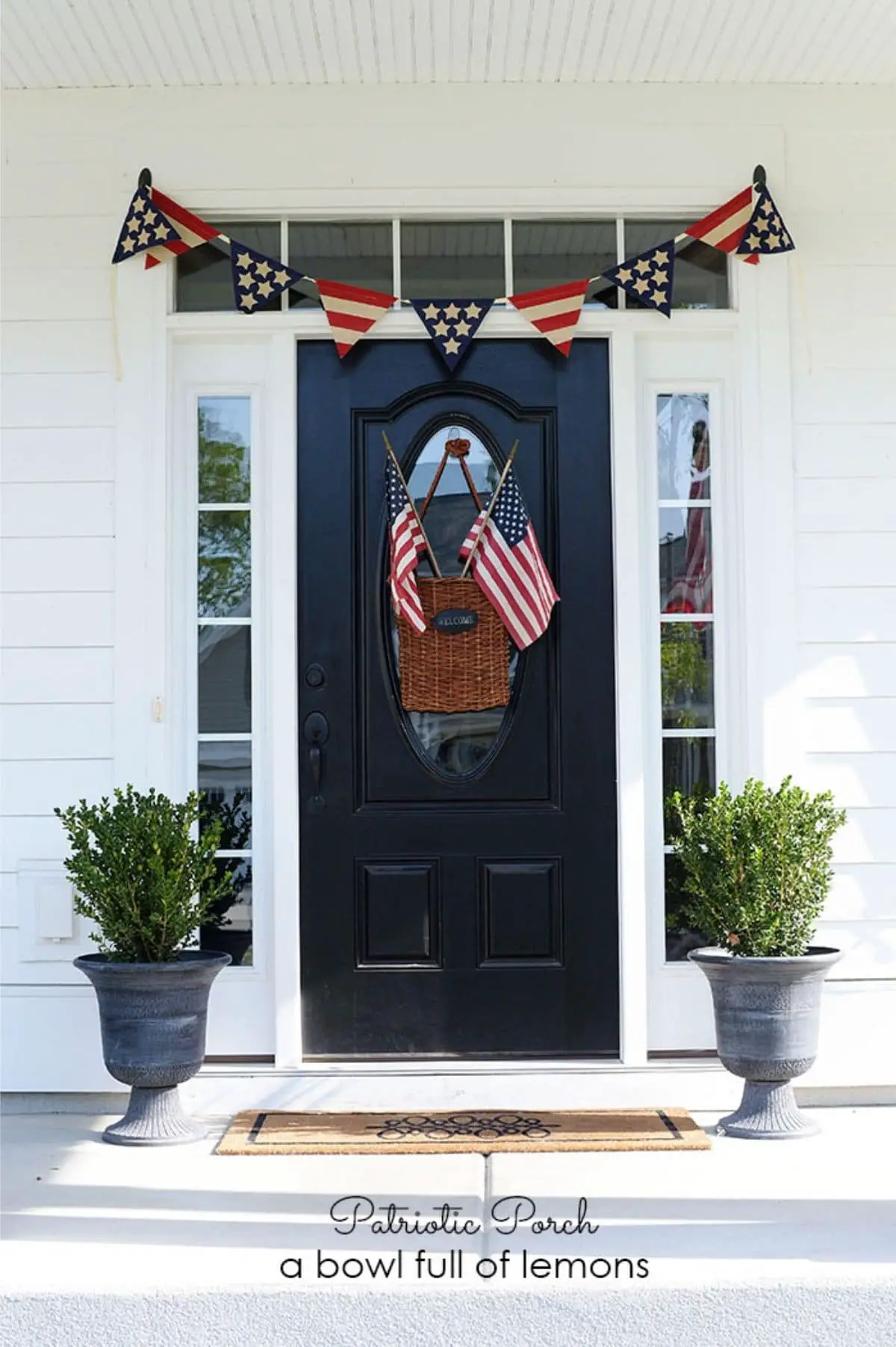independence day porch with flags and flag banner