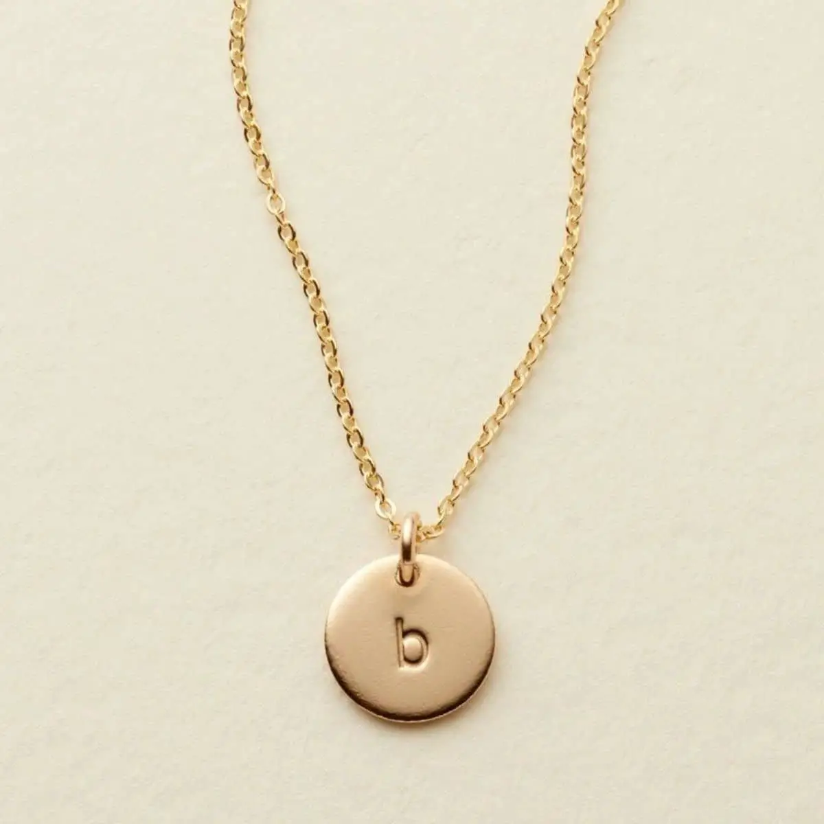 gold personalized initial necklace with the letter b