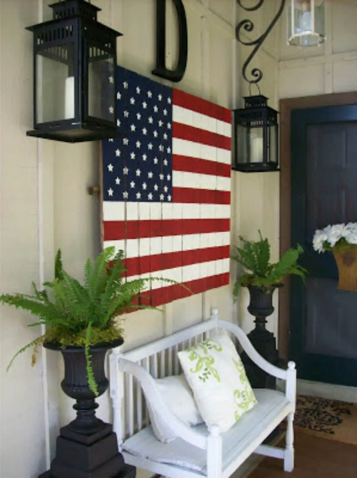 porch with big wooden american flag